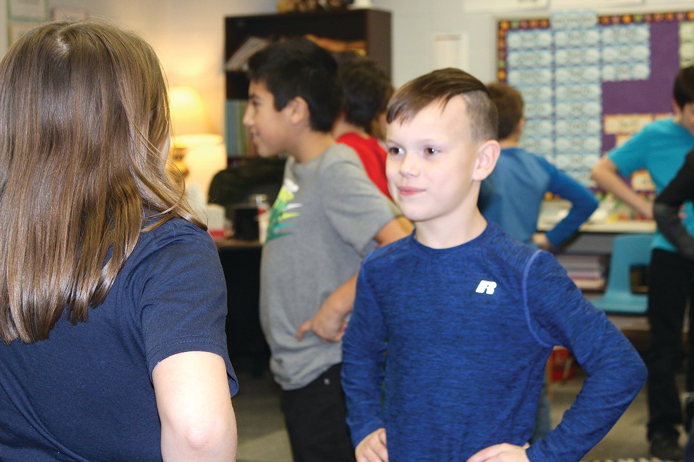 Klayten Waye, Ladoga Canner and future Southmont Mountie, looks his partner in the eye before taking the next dance step Thursday in Jennifer Ellingwood's music class.